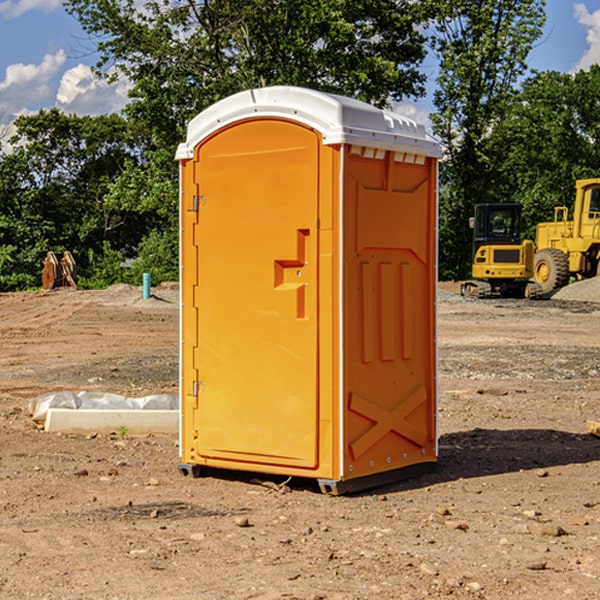 how often are the portable restrooms cleaned and serviced during a rental period in Macon County Alabama